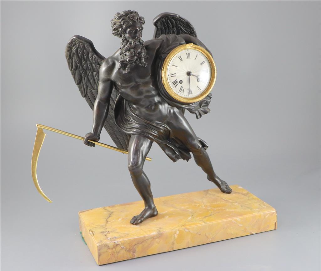 A 19th century French bronze mantel clock, height 17.5in.